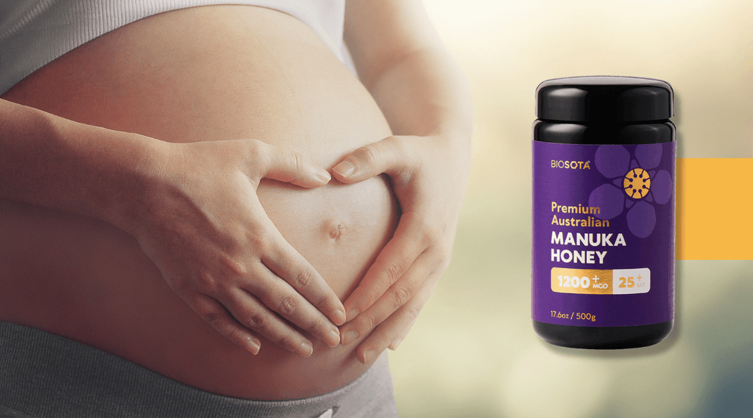 Pregnant woman with Manuka Honey MGO 1200+ forming heart with hands on belly