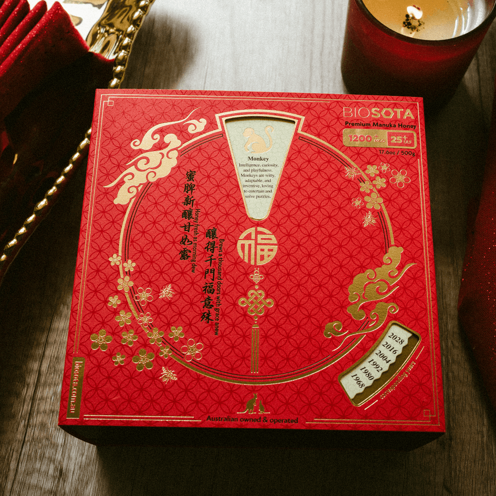 Premium Biosota Organics Manuka Honey MGO 1200+ 500g Lunar New Year luxury gift Box on a table